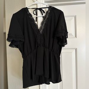 Women’s black fashion top, L